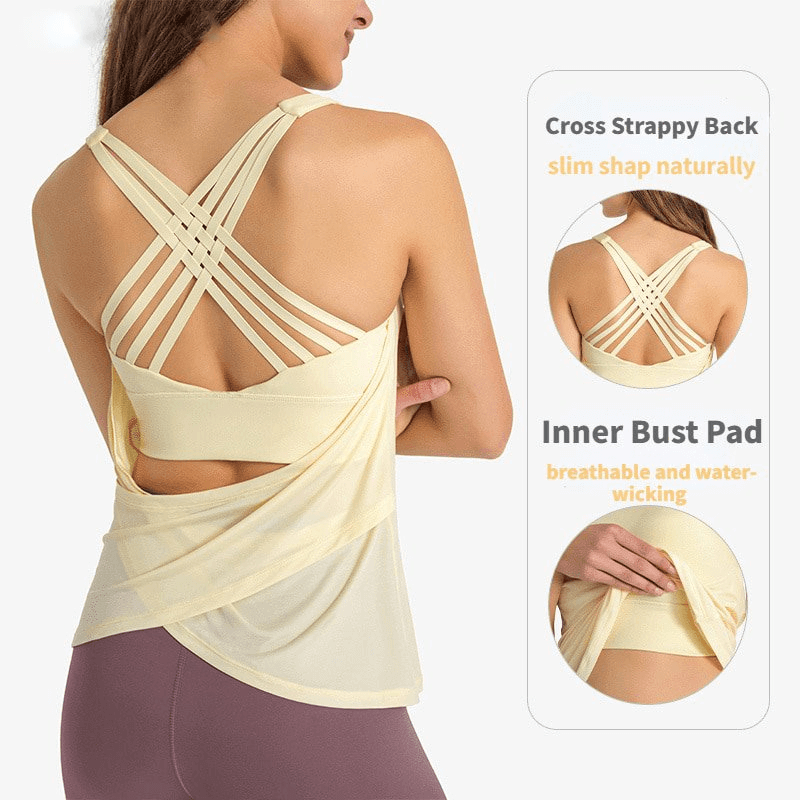 Woman modeling stylish sporty top with open back, cross straps, showcasing comfort and breathability for yoga and workouts.